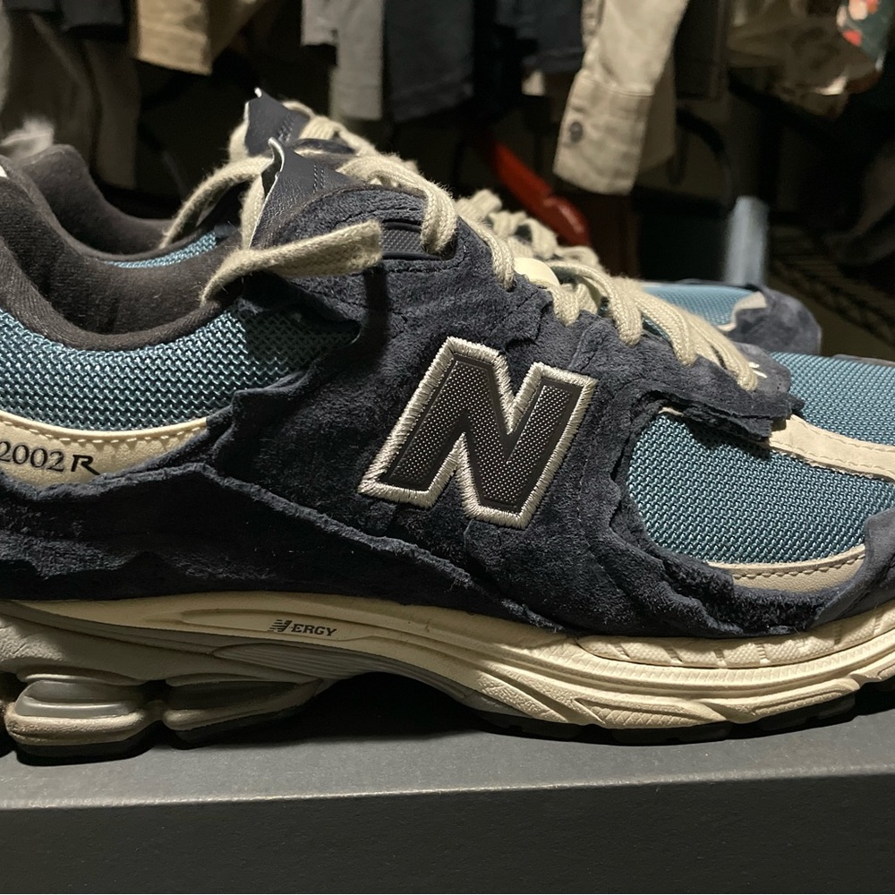The New Balance 2002R Protection Pack Dark Navy size 10